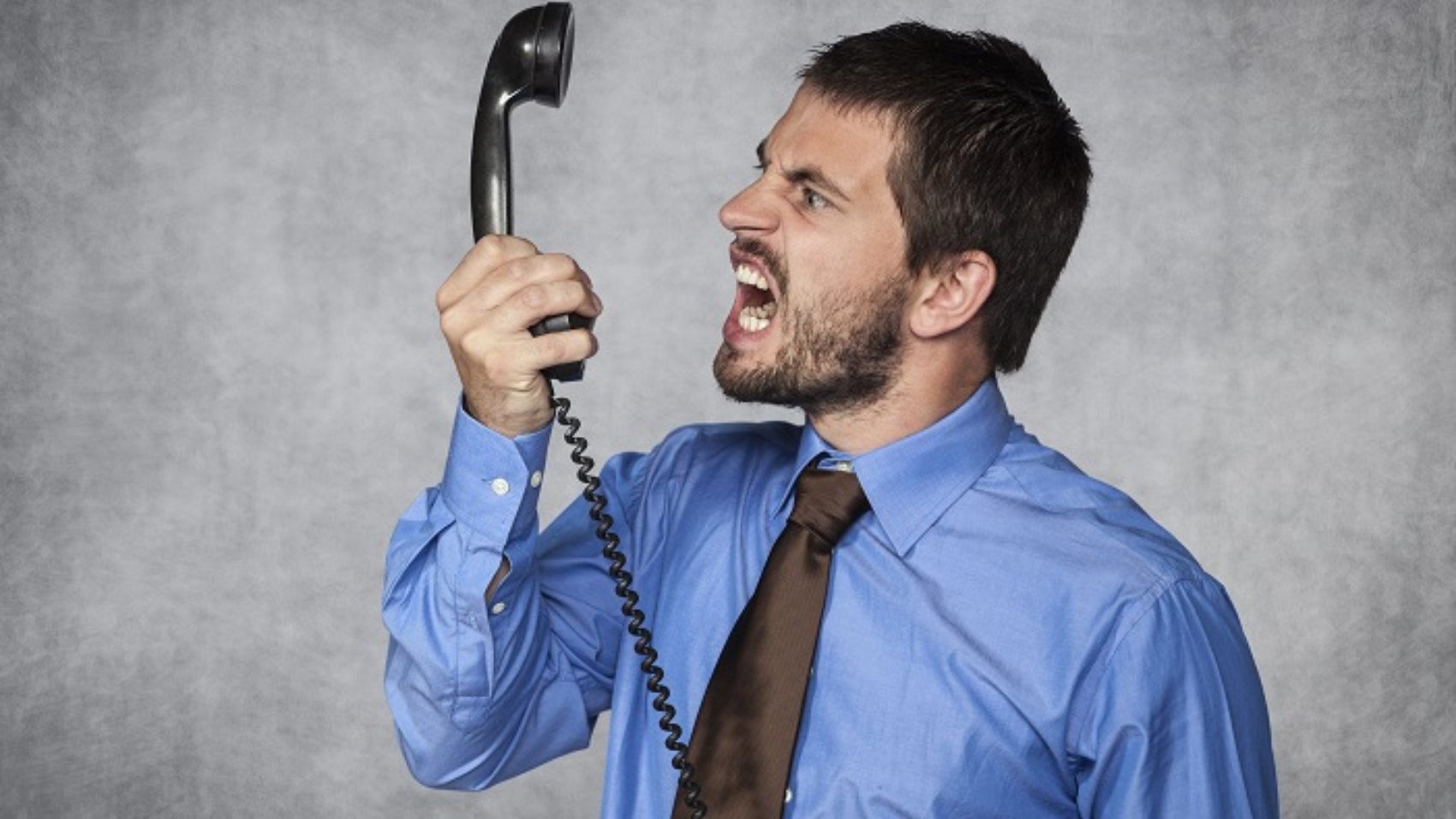 Man yelling into phone